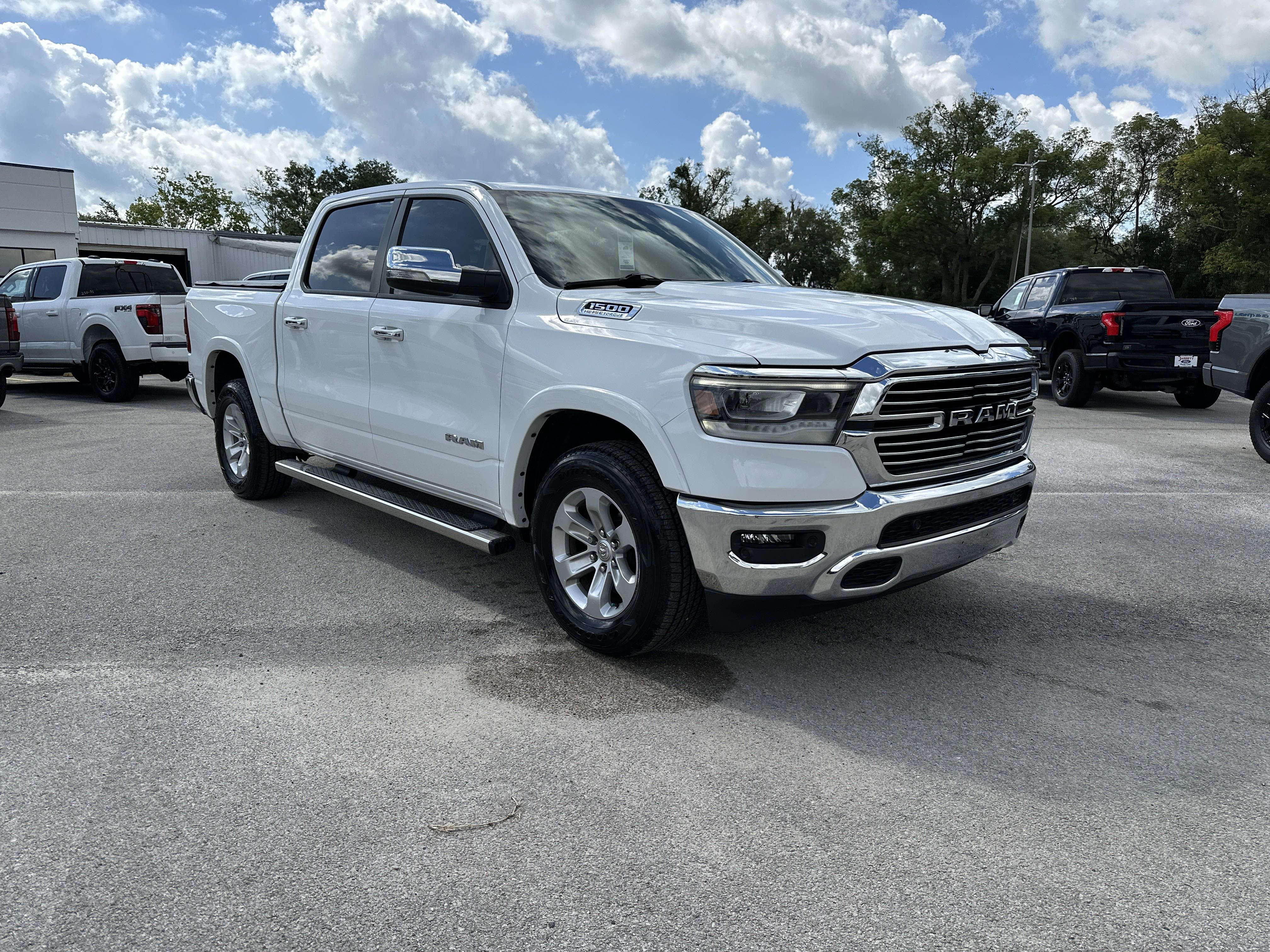 Used 2022 RAM Ram 1500 Pickup Laramie with VIN 1C6RREJTXNN350076 for sale in Dade City, FL