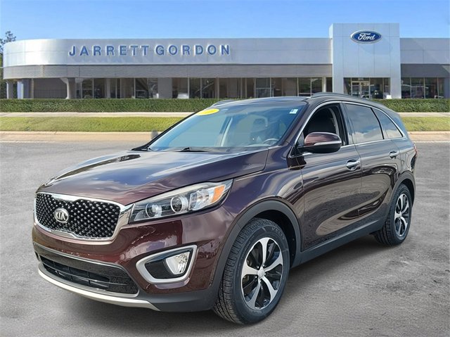 Used 2016 Kia Sorento EX with VIN 5XYPH4A59GG068049 for sale in Winter Haven, FL