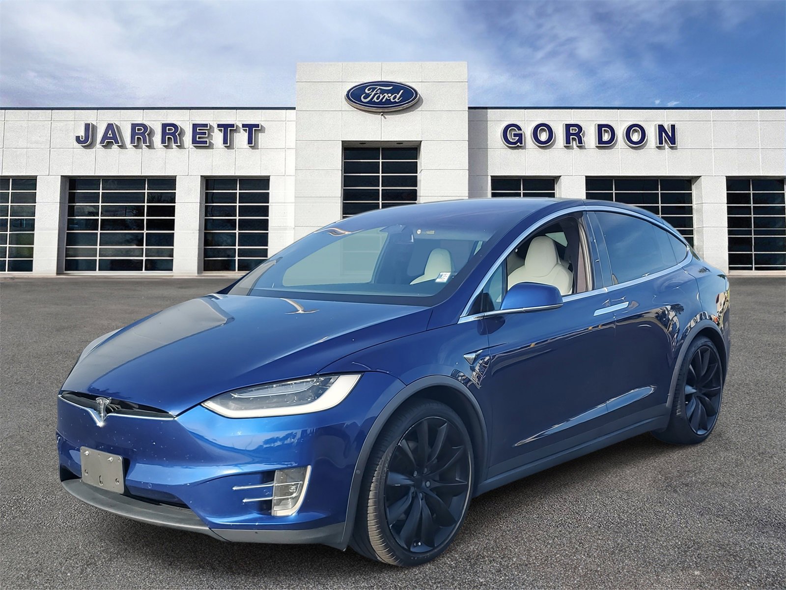 Used 2018 Tesla Model X 100D with VIN 5YJXCAE21JF142561 for sale in Davenport, FL