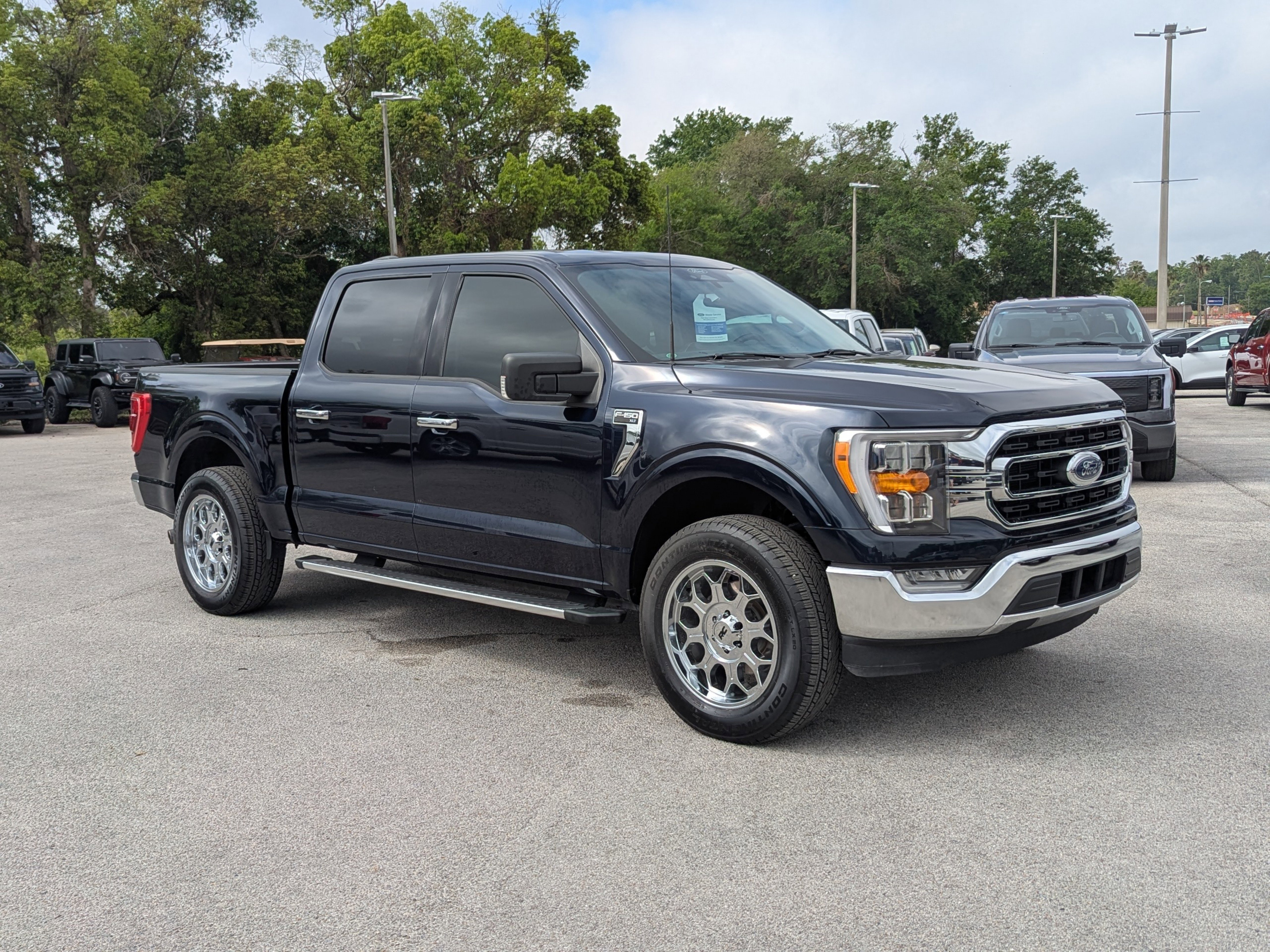 Used 2022 Ford F-150 XLT with VIN 1FTEW1CP4NFC05490 for sale in Dade City, FL