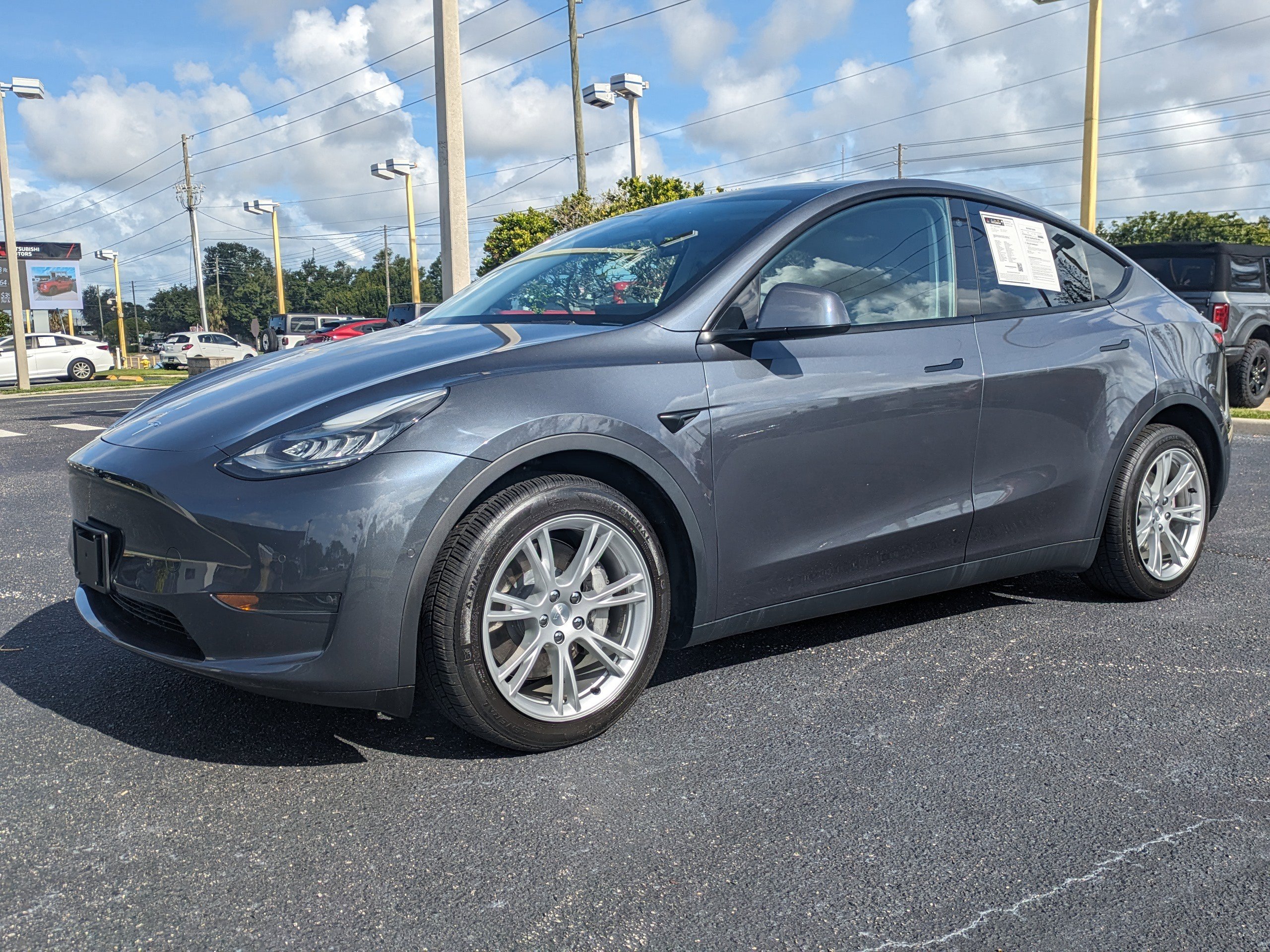 Used 2021 Tesla Model Y Long Range with VIN 5YJYGDEE5MF063368 for sale in Seminole, FL