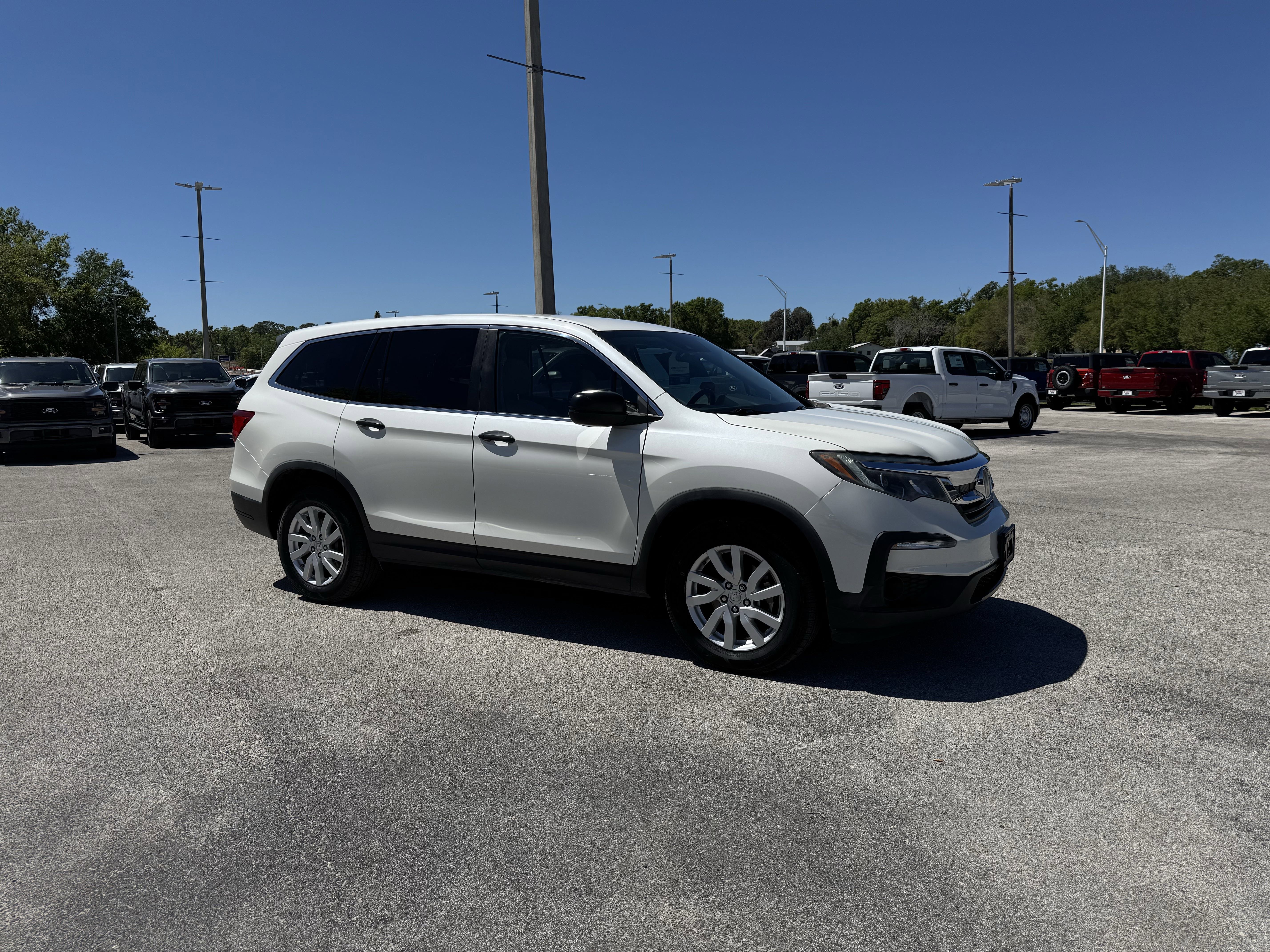 Used 2019 Honda Pilot LX with VIN 5FNYF6H10KB058583 for sale in Dade City, FL